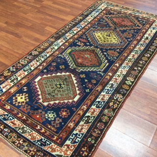 # 2294-  Antique Kazak Caucasian rug with the size 3 ft. 8 inches by 7 ft. 9 inches, excellent condition with slight oxidized browns.        