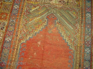 Early Turkish Prayer Mudjar rug,size 4ft. 5ft 4 inches, circa 1850. This rug is in good condition, missing last outer guard borders, some older repair and patches.      