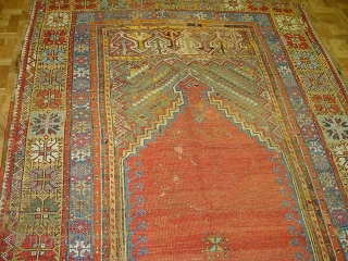 Early Turkish Prayer Mudjar rug,size 4ft. 5ft 4 inches, circa 1850. This rug is in good condition, missing last outer guard borders, some older repair and patches.      