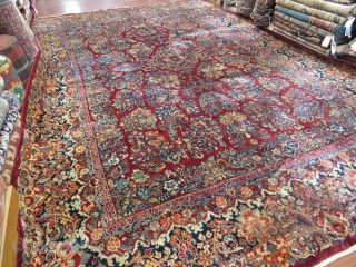 Mint large size antique Persian Sarouk Rug-2290. Central Persia, size 10 ft. 10 inches by 15 ft. 8 inches, circa 1920. large floral design in blue,rose,green,tan and red on deep red field,floral  ...