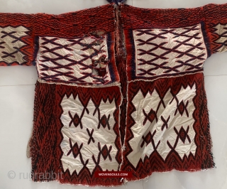 Fragment of a cape from an ethnic minority - Guizhou, Weining, China. Has damage in one quarter section of the front. See more here: https://wovensouls.com        