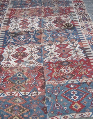 Anatolian Village Kilim, probably Gaziantep, South East Anatolia,pre 1900s. Scores very high on the 'Soul' element.
It is in a 'lived heartily & weary' condition and needs be provided with tender loving care.  ...
