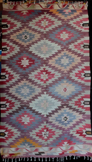 An old “eye dazzler” Manastir kilim from the Kotel region of central Bulgaria from about the 1930s. Finely woven wool on fine cotton warp, natural and aniline dyes (incl. orange). Faded on  ...