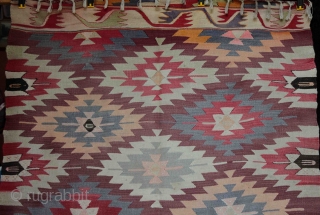 An old “eye dazzler” Manastir kilim from the Kotel region of central Bulgaria from about the 1930s. Finely woven wool on fine cotton warp, natural and aniline dyes (incl. orange). Faded on  ...