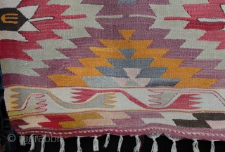 An old “eye dazzler” Manastir kilim from the Kotel region of central Bulgaria from about the 1930s. Finely woven wool on fine cotton warp, natural and aniline dyes (incl. orange). Faded on  ...