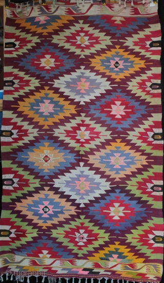 An old “eye dazzler” Manastir kilim from the Kotel region of central Bulgaria from about the 1930s. Finely woven wool on fine cotton warp, natural and aniline dyes (incl. orange). Faded on  ...