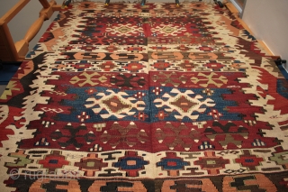 Large 19th century central Anatolian kilim

Compartment type kilim with large S hook bands and a striking and very unusual border design like winged eagles or vultures echoed in the embroidered winged cicim  ...