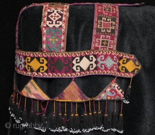 Rare Uzbek Lakai tribe camel headdress.

This camel headdress is formed from three different silk needlepoint embroidered bands, each with different borders, the main lower band with meander borders. Judging rom the motifs  ...