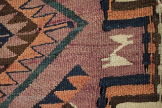 A large old east Afghan tent kilim. Hand spun dyed brown/purple sheep wool in the field/background with some abrash and natural white wool and I a combination of natural and synthetic dyes  ...