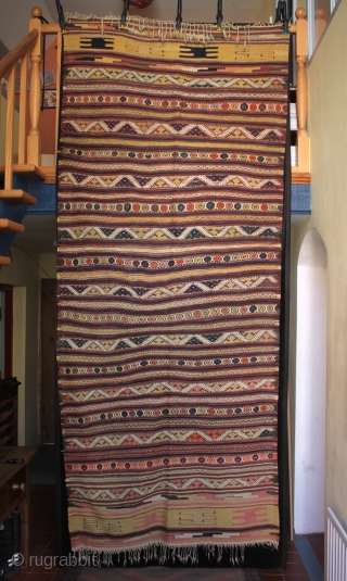 Unusual large West Anatolian Karakecili çiçim embroidered kilim

Detailed çiçim embroidered bands with some corrosion to the dark brown çiçim wool. In very good complete original condition with full end borders and fringes  ...