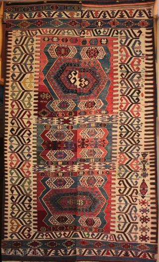 Antique Anatolian Konya region Hotamis dowry kilim with a complex border design also found in Aydin Cine kilims. The kilim shows interesting variations in style, drawing and intention in the weaving of  ...