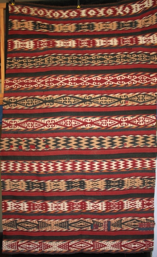 Antique Central Asian Uzbek Ghudgeri kilim or 'jajim' woven in seven joined panels with 12 decorated bands. A strong tightly woven kilim with well made, sympathetic small nomadic patched repairs using pieces  ...