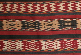 Antique Central Asian Uzbek Ghudgeri kilim or 'jajim' woven in seven joined panels with 12 decorated bands. A strong tightly woven kilim with well made, sympathetic small nomadic patched repairs using pieces  ...