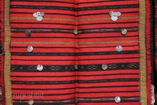A late 19th century Bulgarian pristilka apron from the Vratsa region with over 160 Ottoman silver alloy coins stitched along the side and bottom edges and front. Very finely woven flat weave  ...
