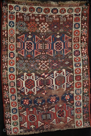 19th century Bakhtiari carpet fragment, perhaps half a complete rug. Beautiful colours, animals, stars/flowers and other tribal motifs. Mainly good condition with areas of low pile, a couple of fold lines and  ...