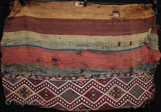 Antique Anatolian chuval from East Anatolia with intense natural dyes.

An unusual survivor, a 19th century East Anatolian chuval with beautiful natural dyes in original condition with old nomadic patch repairs and some  ...