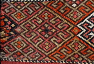 An old Anatolian long kilim runner, tightly woven flat weave with very fine çiçim and soumak embroidery, I estimate from the 1920s. Excellent drawing, good colours and in very good condition. 285x84cm

For  ...