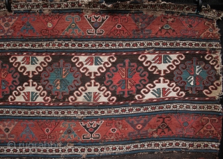 Antique Shahsavan soumac and kilim mafrash panel.

Unusually still with part of its striped kilim base intact, this mid 19th century Shahsavan mafrash is in original condition, finely woven and with good colours.  ...