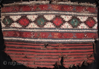 Antique Shahsavan soumac and kilim mafrash panel.

Unusually still with part of its striped kilim base intact, this mid 19th century Shahsavan mafrash is in original condition, finely woven and with good colours.  ...