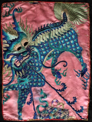 Antique Chinese silk embroidered panel of a Qilin.

Silk embroidery on fine silk fabric with gold bound metallic thread defining the drawing of the qilin, a treasure chest and guarding serpent. The embroidery  ...