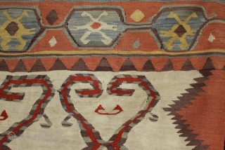 An interesting and unusual antique Anatolian kilim sofra from the village of Hotamis near Konya. Tightly woven, fine kilim with charming primitive drawing of motifs. In good condition with a small repair  ...