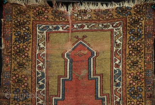 A 19th century (mid?) central Anatolian Muçur or Mujur prayer rug. A nice grass green above the mirhab prayer niche. In worn condition with loss to ends and foundation showing as seen  ...