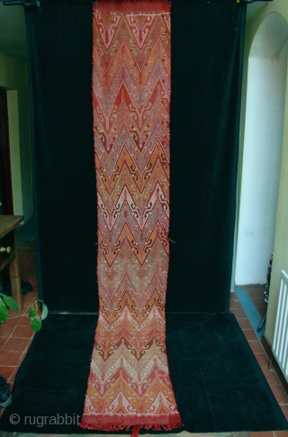 Finely woven long, narrow zili embroidered kilim made by Horzumlu-Aydinli yoruk nomads from Hatay in east Anatolia.

Wintering in Hatay near the Syrian border, the Horzumlu-Aydinli nomads had their summer pastures in the  ...