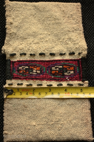 Miniature Turkoman or Turkmen khorjin saddle bag

Only 9 inches long and 5 1/2 inches wide, an unusual and collectible bag. In very good overall condition with some of the simple wool closing  ...