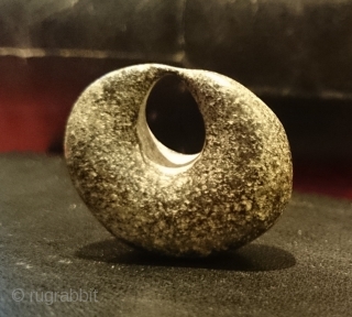 An intriguing ancient bronze crescent moon shaped object found in Kayseri, Anatolia.

Is it an Assyrian or Hittite loom weight as suggested to me or perhaps made as jewellery? An amulet of some  ...