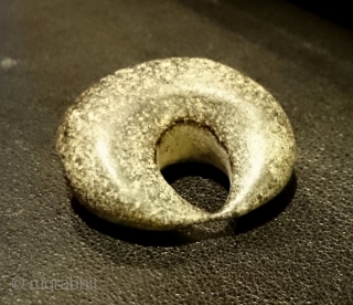 An intriguing ancient bronze crescent moon shaped object found in Kayseri, Anatolia.

Is it an Assyrian or Hittite loom weight as suggested to me or perhaps made as jewellery? An amulet of some  ...