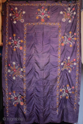 Uzbek silk suzani in niche form.

From a collection of Syrian shawls and other antique textiles acquired in Turkey in September; silk embroidered suzani from Uzbekistan in niche form, perhaps related to a  ...