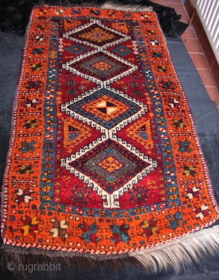 Beautiful old east Anatolian Kurdish rug from Yavuzeli near Gaziantep with harlequin pair of yastik cushions.

Hand spun lustrous wool on an alternating white and black goat hair warp, vibrant colours including a  ...