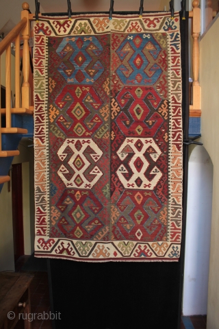 Central Anatolian kilim from Aksaray near Konya with very large guls a beautiful rich colour palette from natural dyes with good abrash. Originally a longer kilim, probably twelve guls, and skilfully reduced  ...