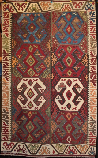 Central Anatolian kilim from Aksaray near Konya with very large guls a beautiful rich colour palette from natural dyes with good abrash. Originally a longer kilim, probably twelve guls, and skilfully reduced  ...