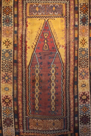 Large antique Anatolian prayer kilim from Yahyali.

From the 1st quarter of the 1900s and in excellent unrestored original condition with two small professional repairs to a slight separation in a 2cm length  ...