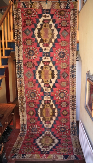 Finely woven and crisply drawn old east Anatolian kilim from Adana with an unusual and particularly lovely field background colour. In excellent usable condition. Size 442 x 156cm.

For detailed photos, see the  ...