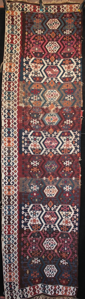 Antique east Anatolian kilim from the Reyhanli/Malatya area with beautiful natural colours

In good original unrestored condition with corroded brown in the upper centre (normal for a kilim of this age) and a  ...