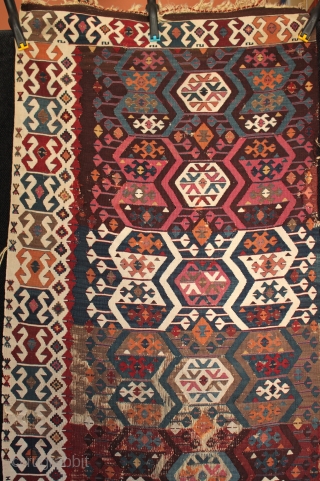 Antique east Anatolian kilim from the Reyhanli/Malatya area with beautiful natural colours

In good original unrestored condition with corroded brown in the upper centre (normal for a kilim of this age) and a  ...