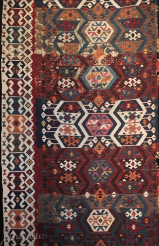 Antique east Anatolian kilim from the Reyhanli/Malatya area with beautiful natural colours

In good original unrestored condition with corroded brown in the upper centre (normal for a kilim of this age) and a  ...