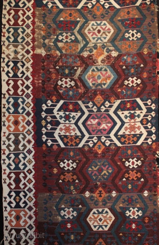 Antique east Anatolian kilim from the Reyhanli/Malatya area with beautiful natural colours

In good original unrestored condition with corroded brown in the upper centre (normal for a kilim of this age) and a  ...