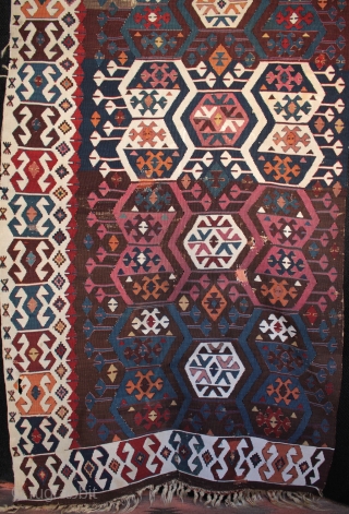 Antique east Anatolian kilim from the Reyhanli/Malatya area with beautiful natural colours

In good original unrestored condition with corroded brown in the upper centre (normal for a kilim of this age) and a  ...