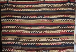 Old Cubuklu kilim from Mugla Province, Anatolia with repeated meander motifs with a Hokusai wave look, also interpreted as yin yang motifs but actually originating from the architectural patterns from the Greek  ...