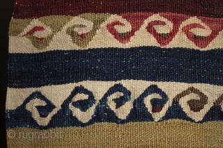 Old Cubuklu kilim from Mugla Province, Anatolia with repeated meander motifs with a Hokusai wave look, also interpreted as yin yang motifs but actually originating from the architectural patterns from the Greek  ...