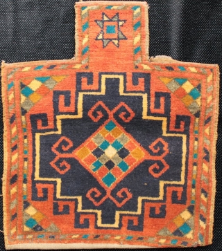 A unique set of 3 charming and very finely knotted salt bags with striped kilim backs each woven in one piece, unstitched at the edges. The Memling guls, checkerboard centres, positive and  ...