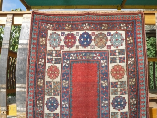 Talish (?) with Red open Field. looks like ends have been restored, about 2-5 cm on every end. the field has some areas that seem to have been repiled. overall good condition.  ...