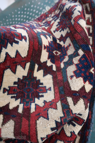 Fragment of an old, rare and colorful turkmen asmalyk (89 cm. x 55 cm.)
Very fine weaving with asymmetrical knotting open to the right. 
Spacious drawing with incredible deep old colors. 
3 small  ...