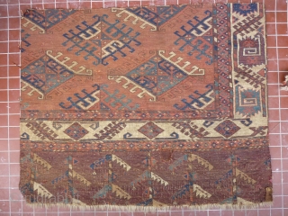 Fragment of a fine old Yomud main carpet.
A complete sample: border, skirt and field. As found condition, needs a bath and a good home.
104cm x 84cm       