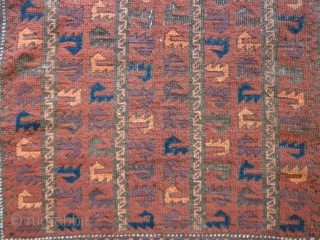 Old Baluch rug of a rare type. 
Complete with skirts. Damages to the selvedges and some wear in the field. Extraordinary complex border and appealing field including some aubergine color.
144cm x 85cm

 