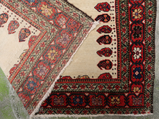Unique, old and colorful 19th c. Farahan rug (190 cm. x 120 cm.) Lovely piece with soft wool and beautiful dyes on an ivory field. There's a reweave (see last picture), sides  ...