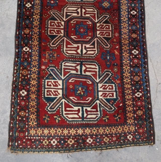 Rare, old and beautiful traditional Karabagh "turtle" 4 medallions rug (270 cm. x 130 cm.) Good condition for its age with high pile all over, some moth bites, few rows of black  ...